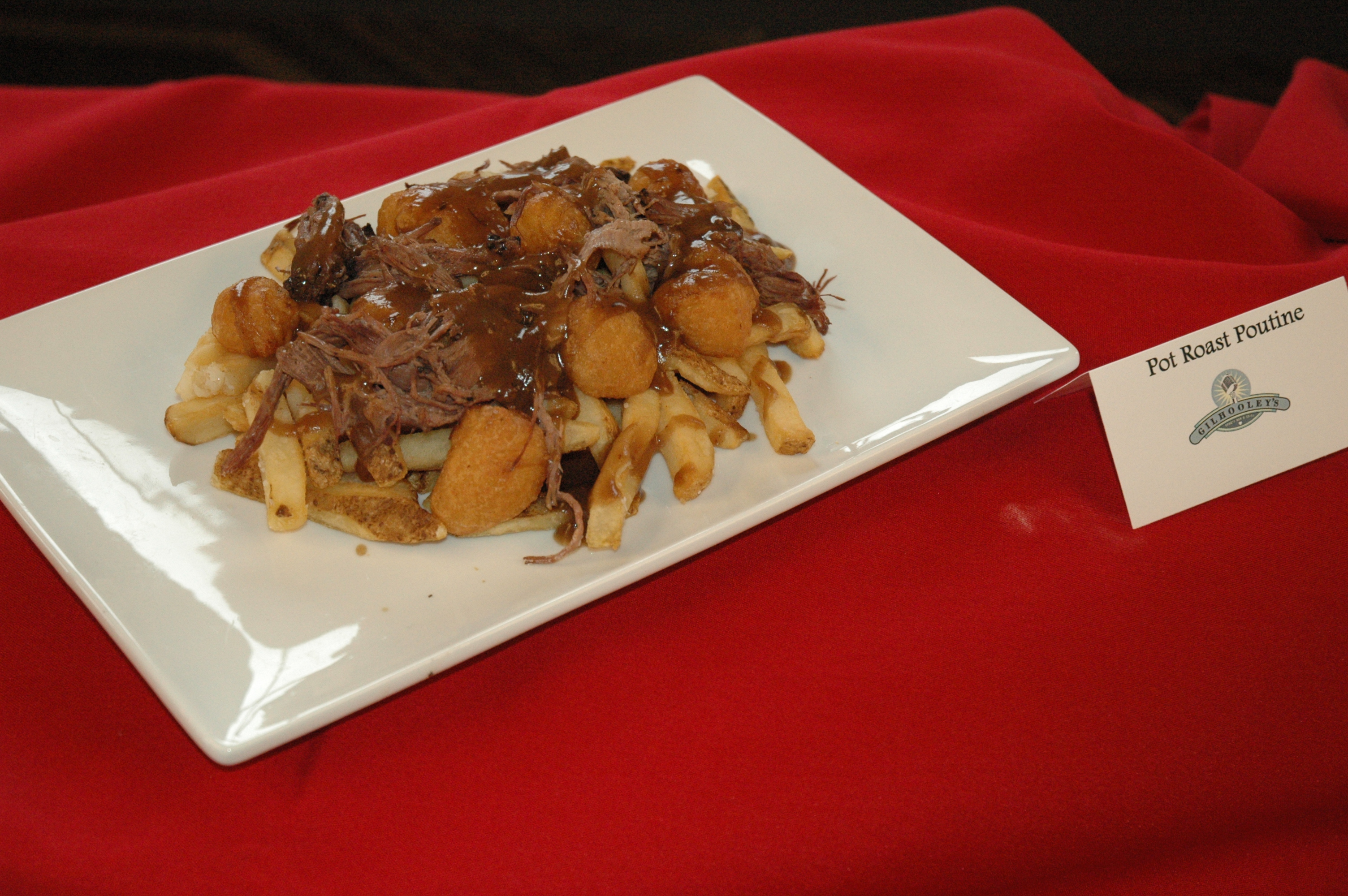 A home run dish, the new Pot Roast Poutine sits on a bed of french-fries and is covered in a gravy-esque sauce that will knock your taste buds right out of the park.